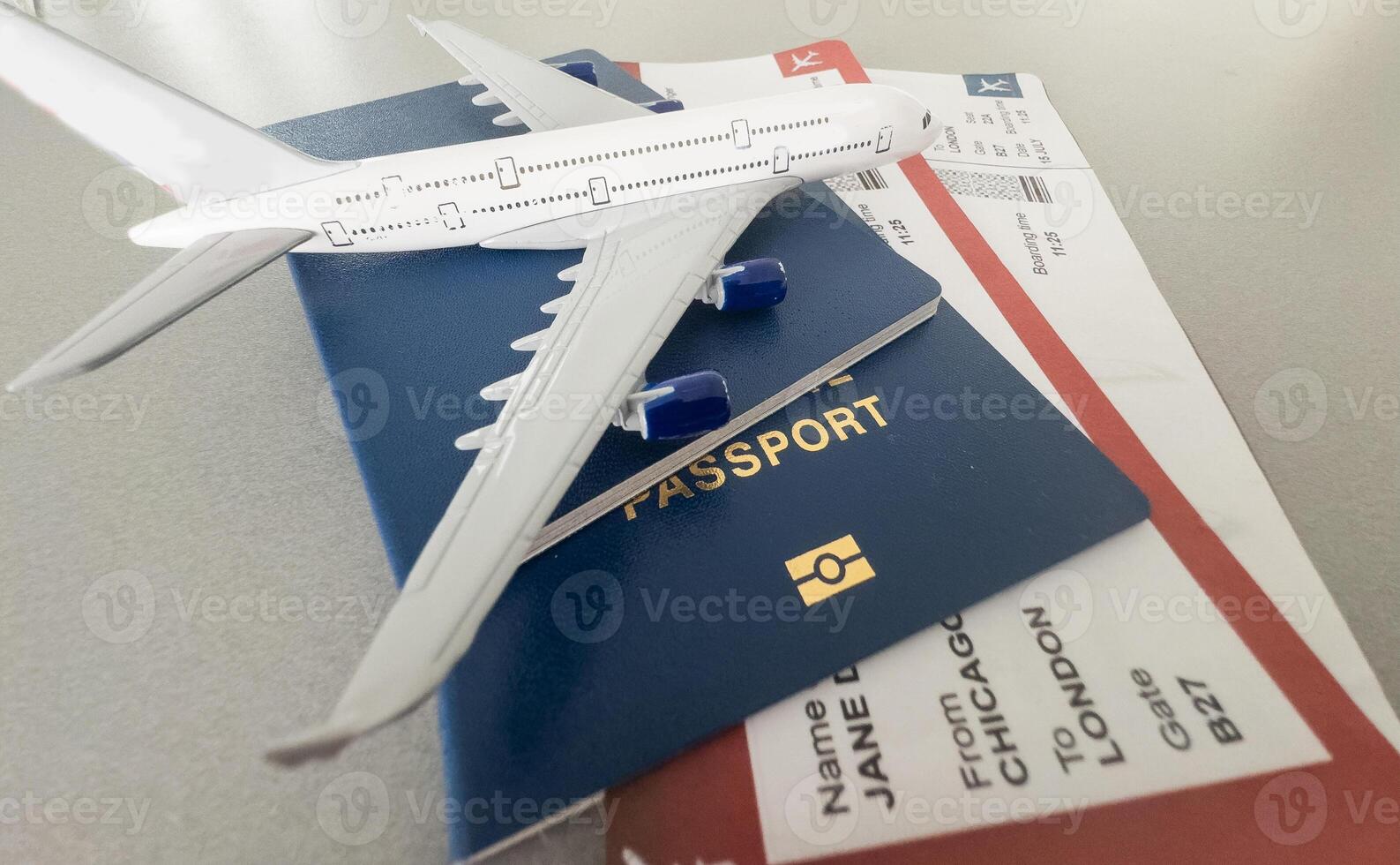 Top view of traveler accessories, passports and air tickets on background with copy space for text. Travel vacation concept photo