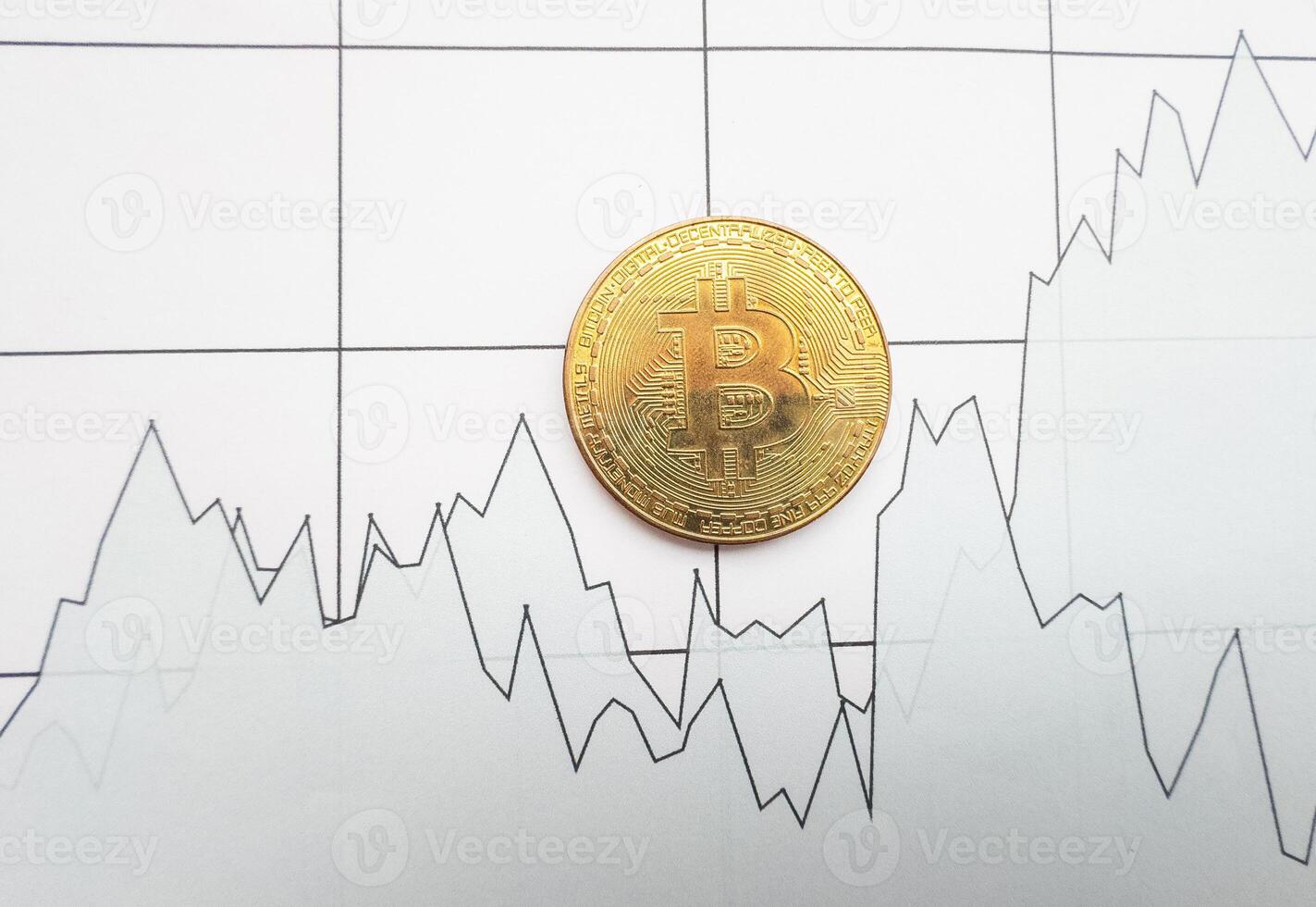Bitcoin on the charts of exchange trades showing the growth and fall of the crypto currency and virtual money background photo