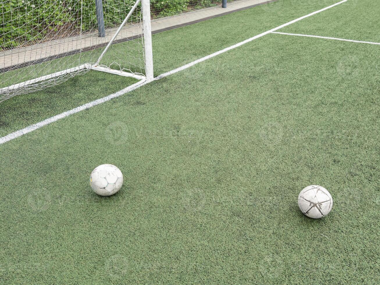 old football on Artificial turf football field green photo