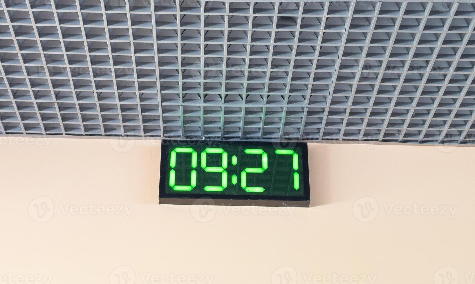 Digital clock in airport terminal. photo