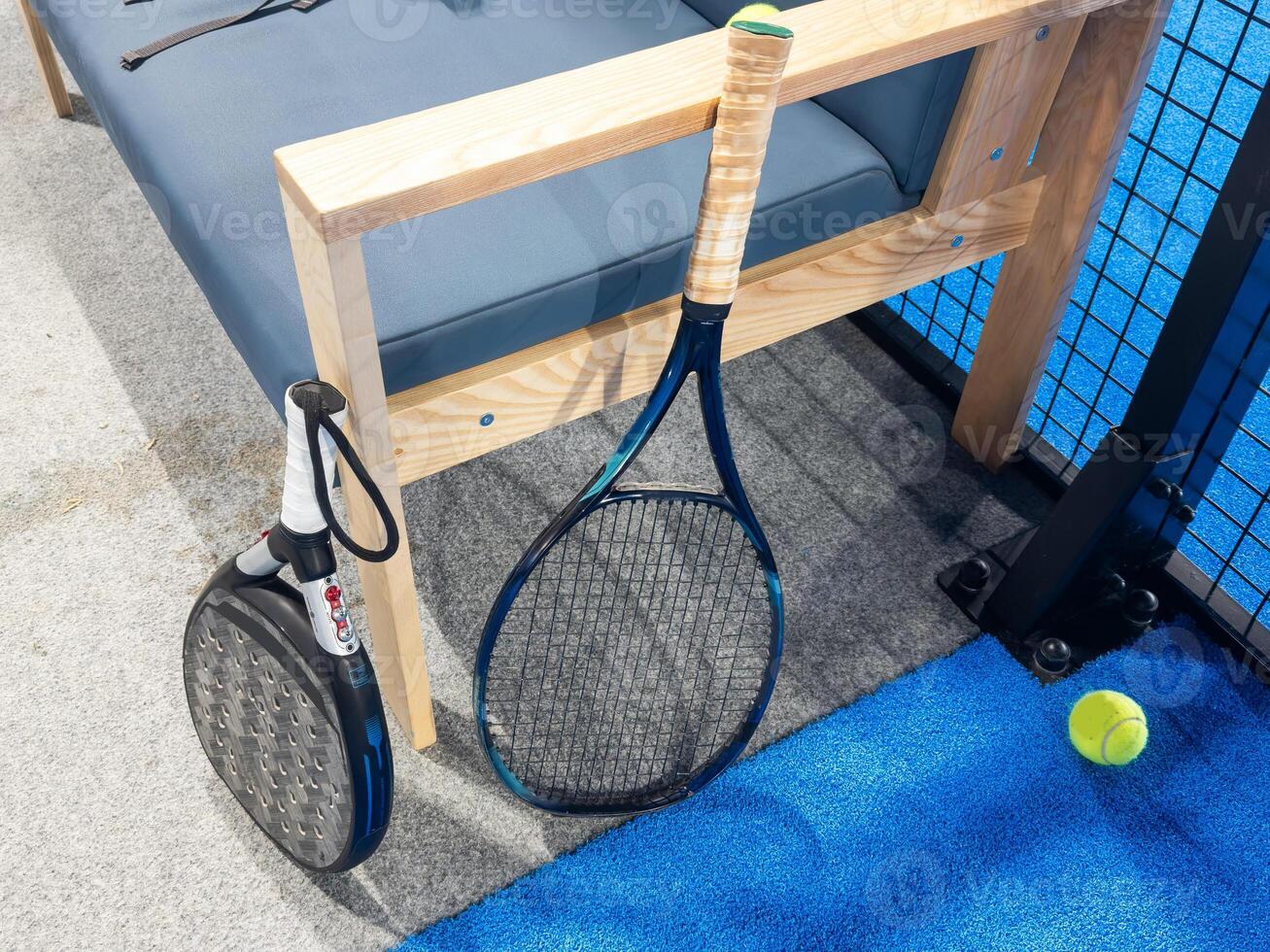 Tennis and padel racquet and ball photo