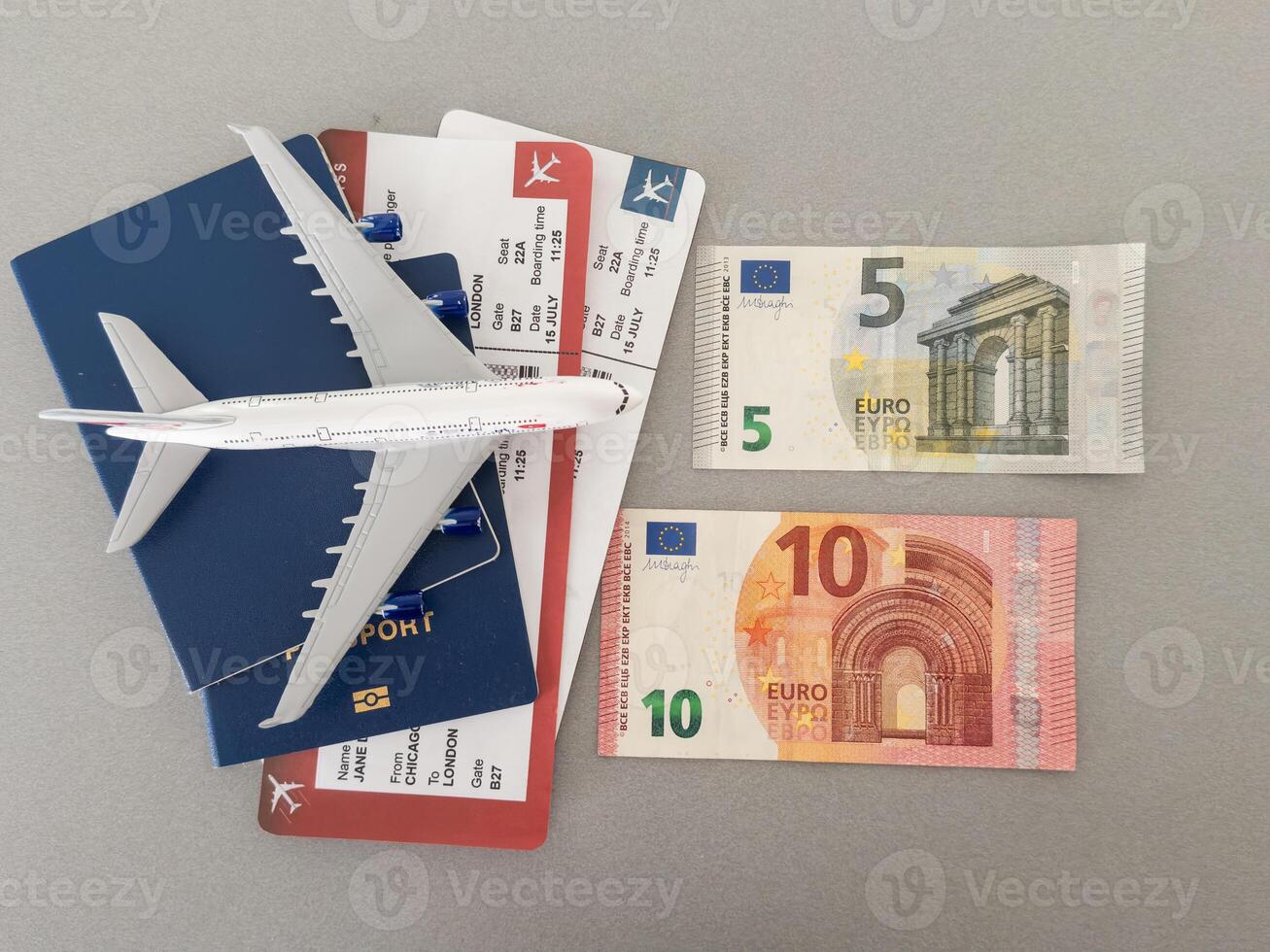 Preparation for Traveling concept, toy airplane, passport with copy space photo