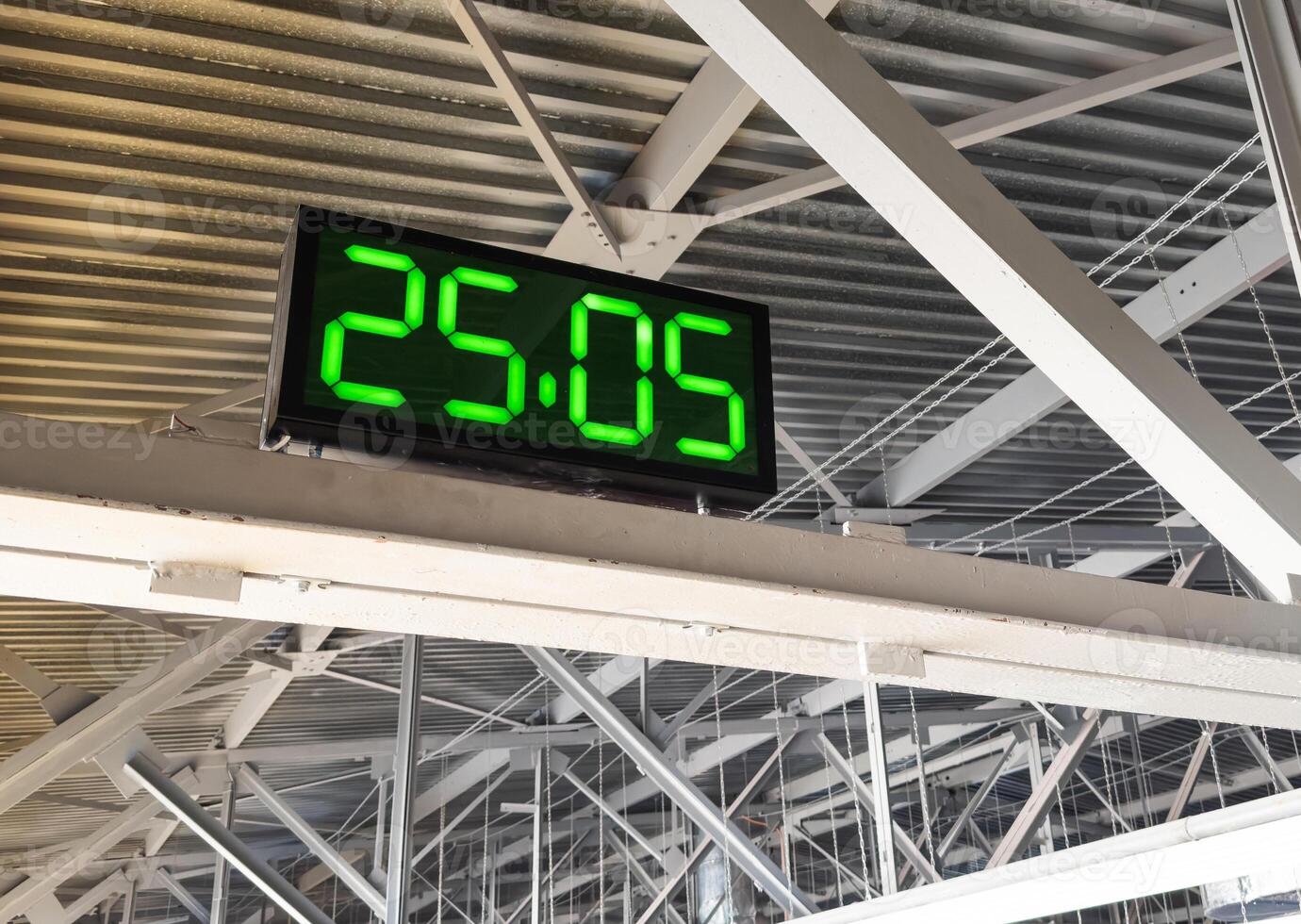 Digital clock in airport terminal. photo