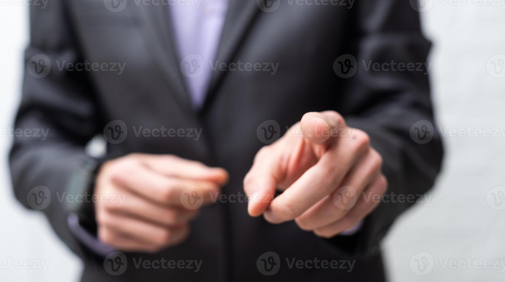 businessman touching an imaginary screen with clipping path isolated on white background photo