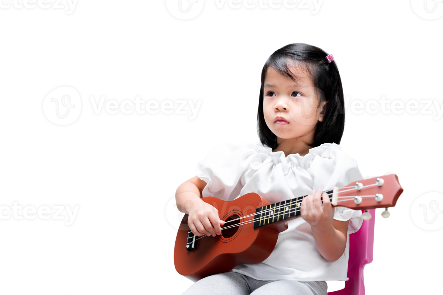 Asian girl practicing playing ukulele with intent expression. Learning music and sheet music. Isolated background. png