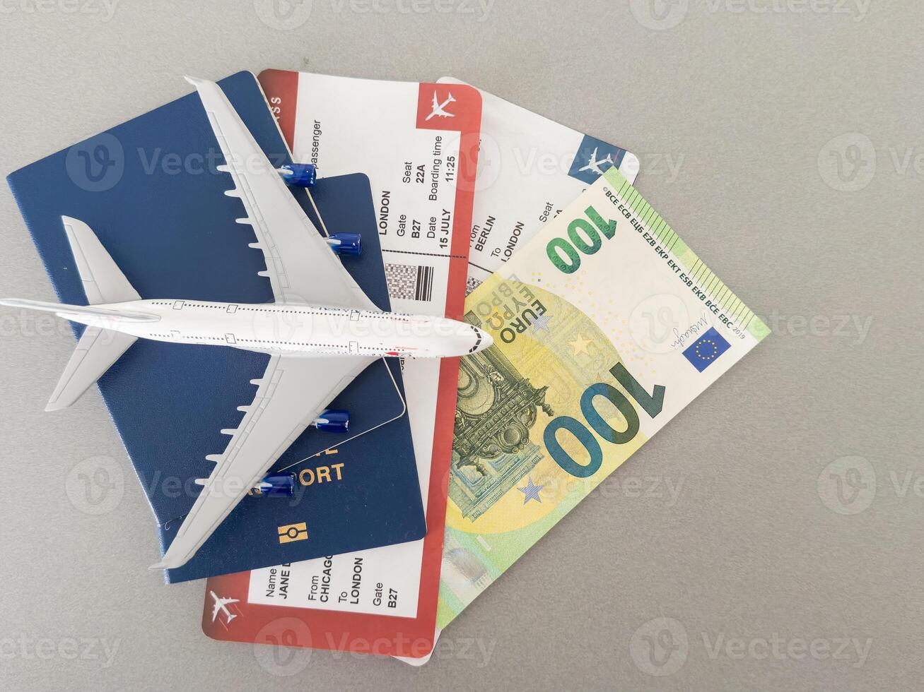 Top view of traveler accessories, passports and air tickets on background with copy space for text. Travel vacation concept photo