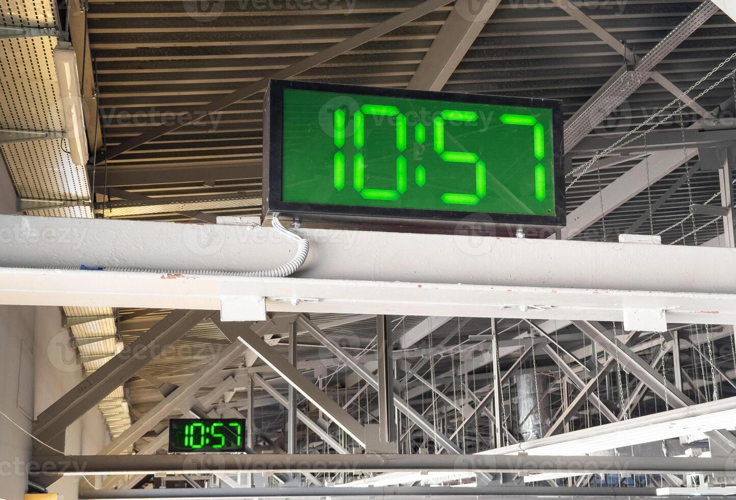 Digital clock in airport terminal. photo