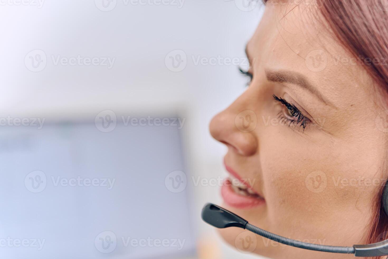 Friendly Call Center Agent Answering Incoming Calls with Headset Providing Remote Customer Service. photo