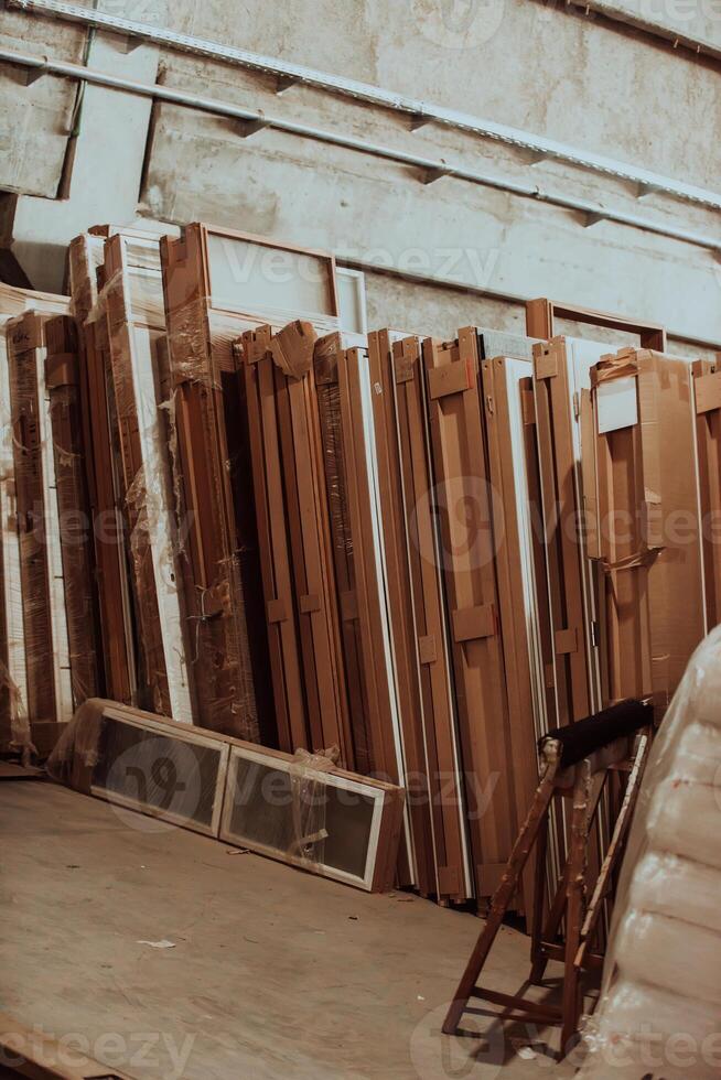 A vast warehouse in the forestry industry, showcasing a plethora of wooden products, including boards and various timber items neatly organized in storage photo