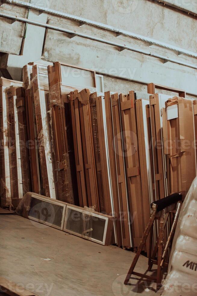 A vast warehouse in the forestry industry, showcasing a plethora of wooden products, including boards and various timber items neatly organized in storage photo