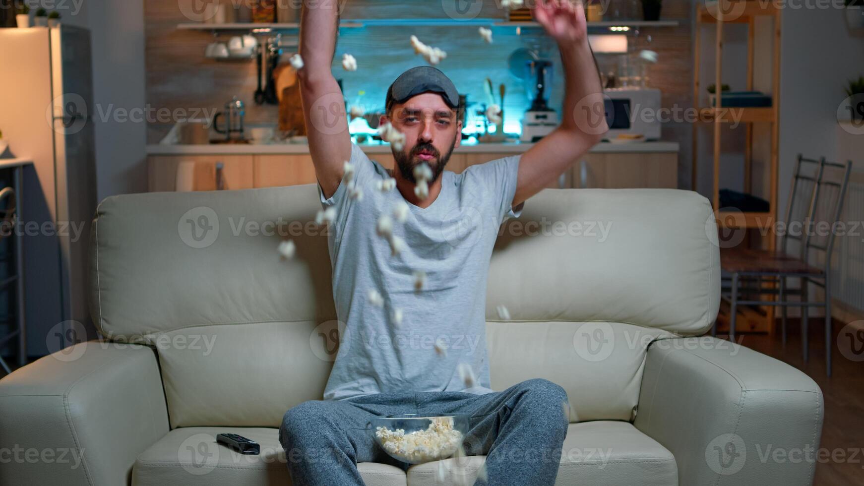 POV dissapointed upset angry man watching sport competition, favourite team loosing big championship. Soccer football fan expressing anger and frustration while watching TV. Slow motion shot photo