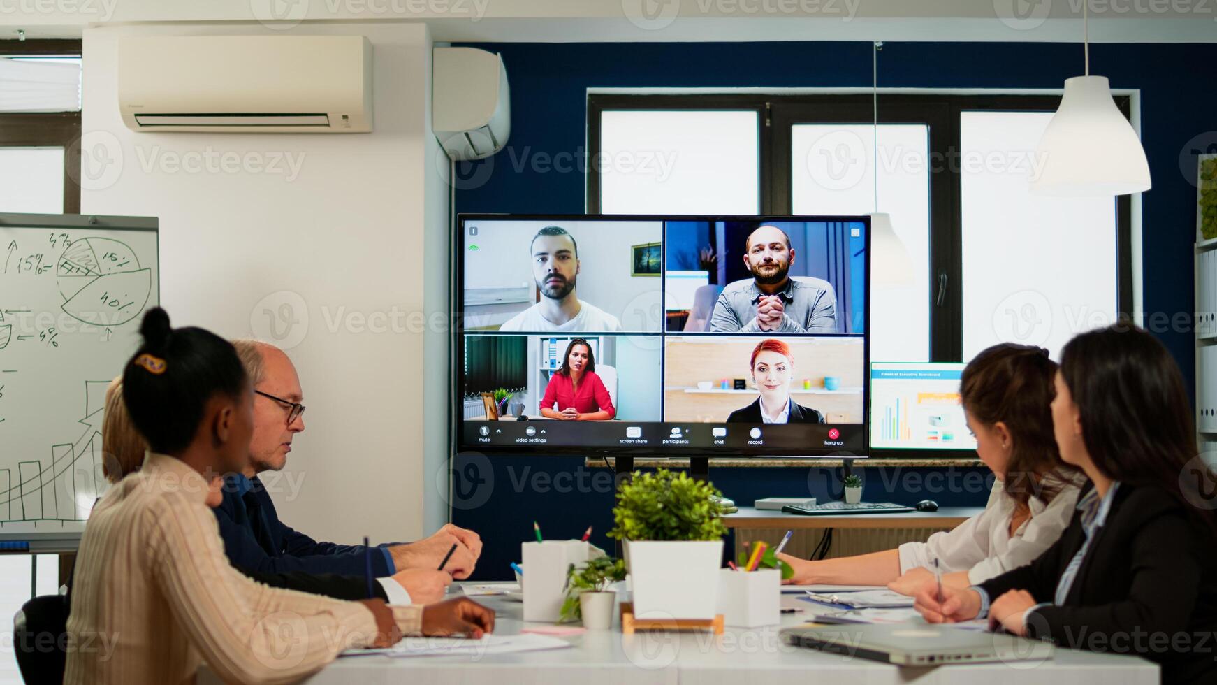 Team working by group call share ideas brainstorming negotiating use conference, pc screen view multi ethnic young people. Diverse people talking at virtual meeting, online discussion. photo