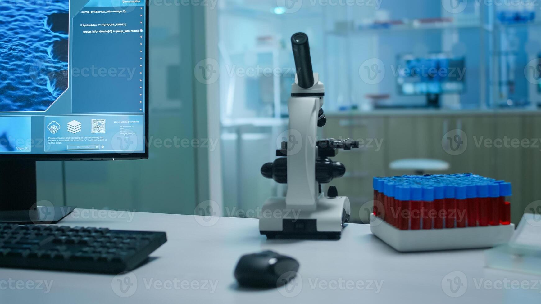 Empty science research laboratory office with microscope on table. No people in lab prepared for pharmaceutical innovation using microbiology tool for scientific research vaccine against covid19 virus photo