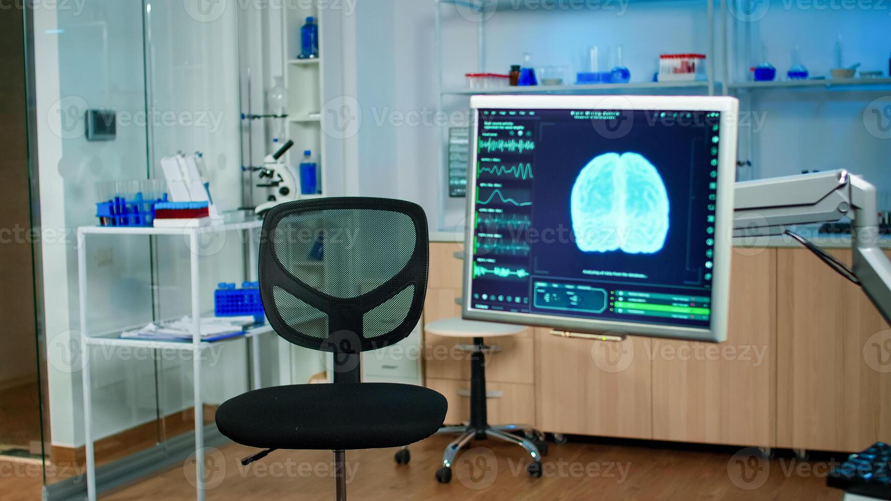 Medical brain scan film showing on monitor in neurology medical clinic. Technologically advanced and functional research office with nobody in it prepared for treatment innovation of nervous system photo