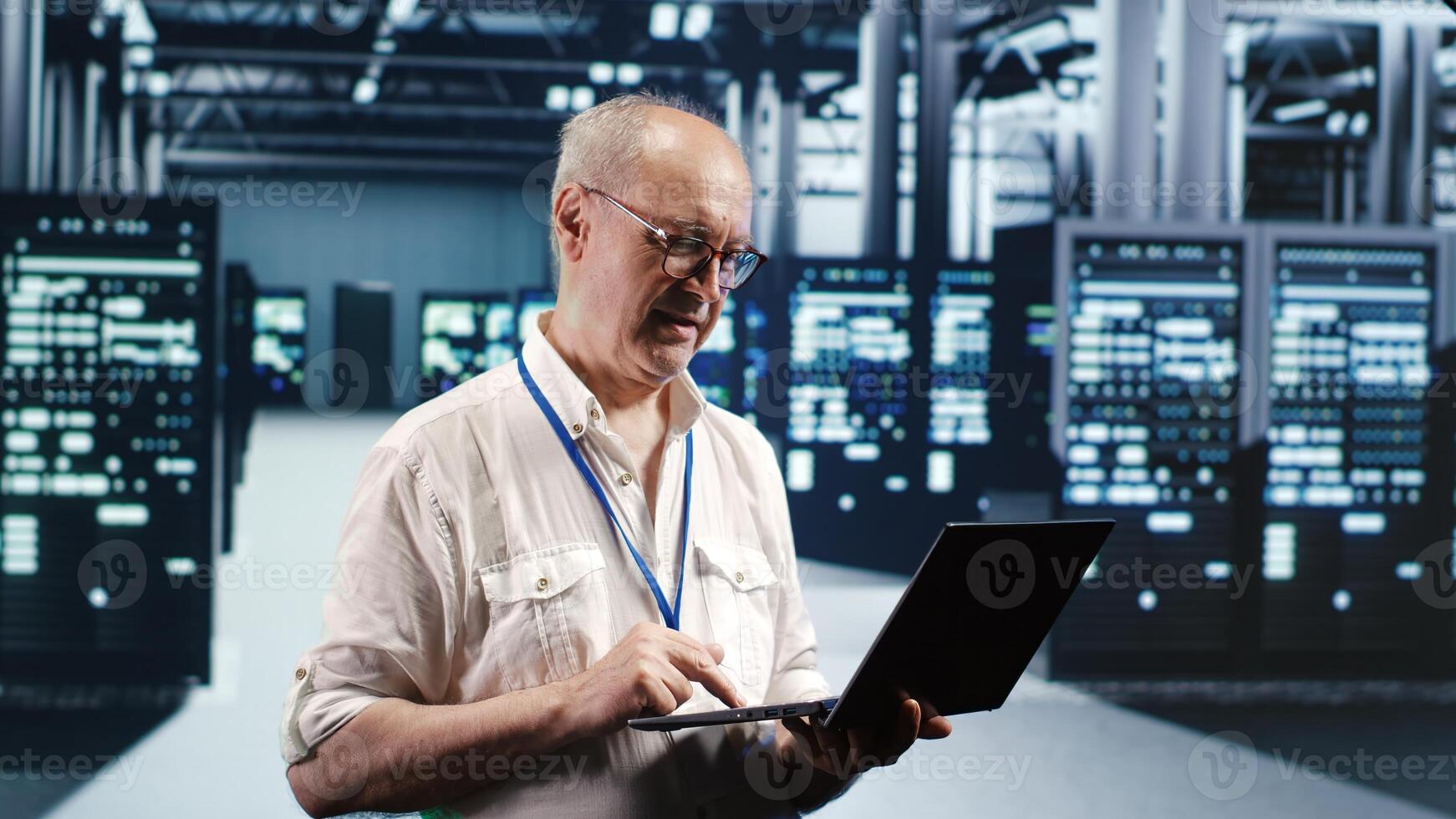 Old professional navigating network of server electronics in industrial hub. IT developer with laptop doing audit and optimizations in high tech data center, preventing system troubles photo