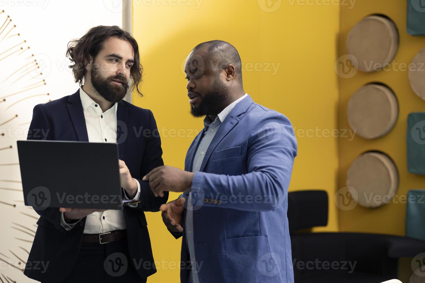 Team of corporation employees preparing their pitch for the shareholders meeting, working on ways to obtain more funds. Colleagues attend a conference to address financial status. photo