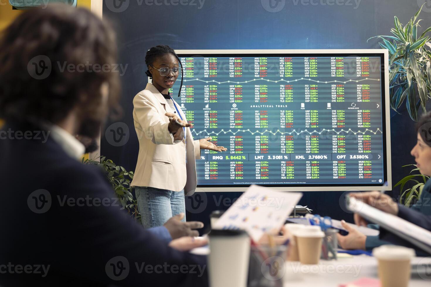 Project team working on annual reports during an executive meeting, detecting what to improve in order to ensure customer experience and retention. Organizational development. photo