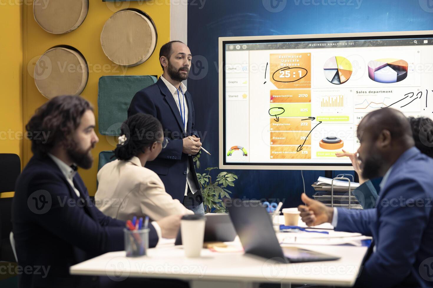 Marketing team attend an information sharing conference to verify updates on regulatory changes or industry standards. Business professionals reviewing all data analysis statistics. photo