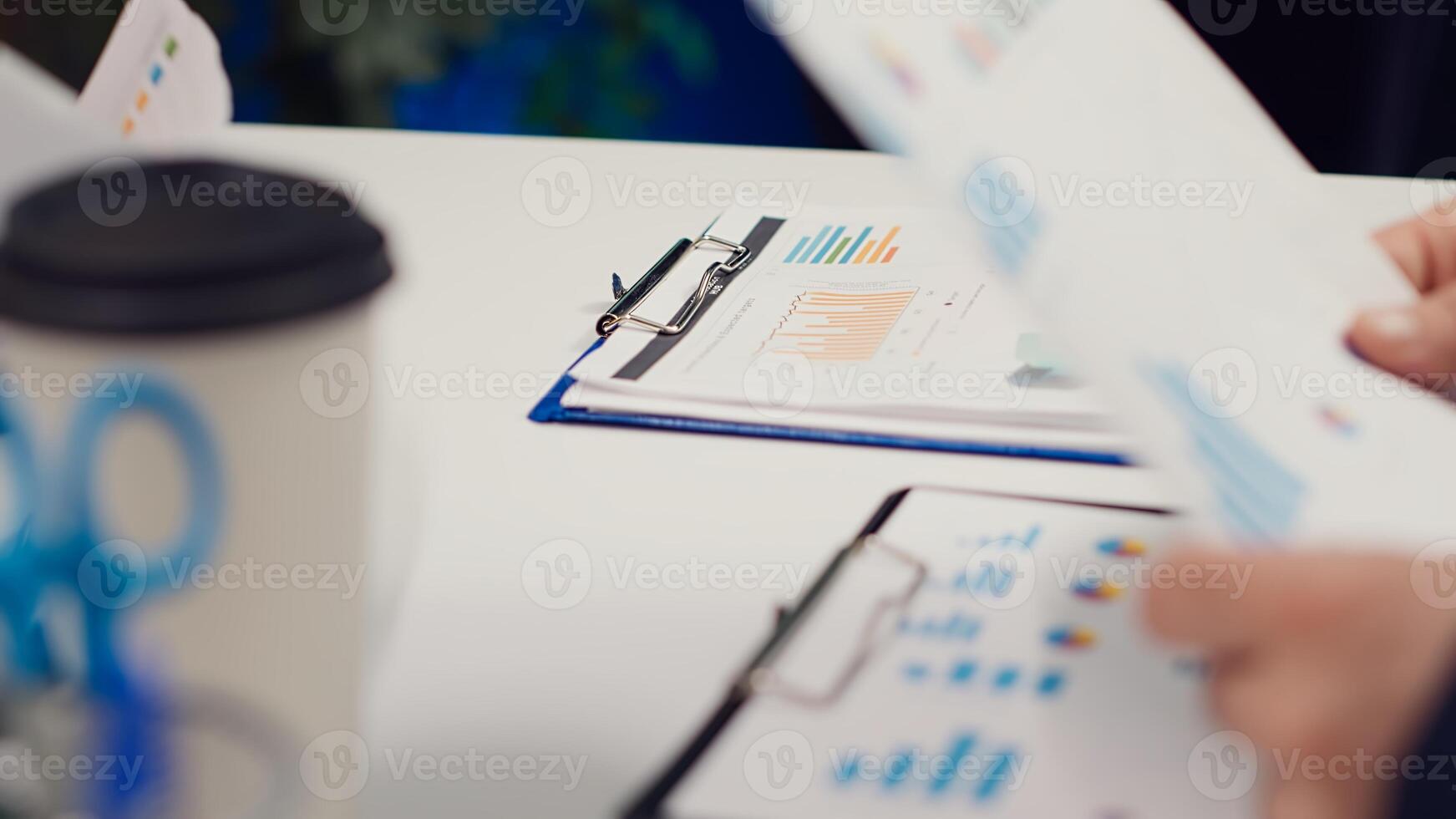Executive team sharing information and updates on project details, briefing session to catch colleagues up to speed. Coworkers develop internal communication strategies to ensure success. Camera A. photo