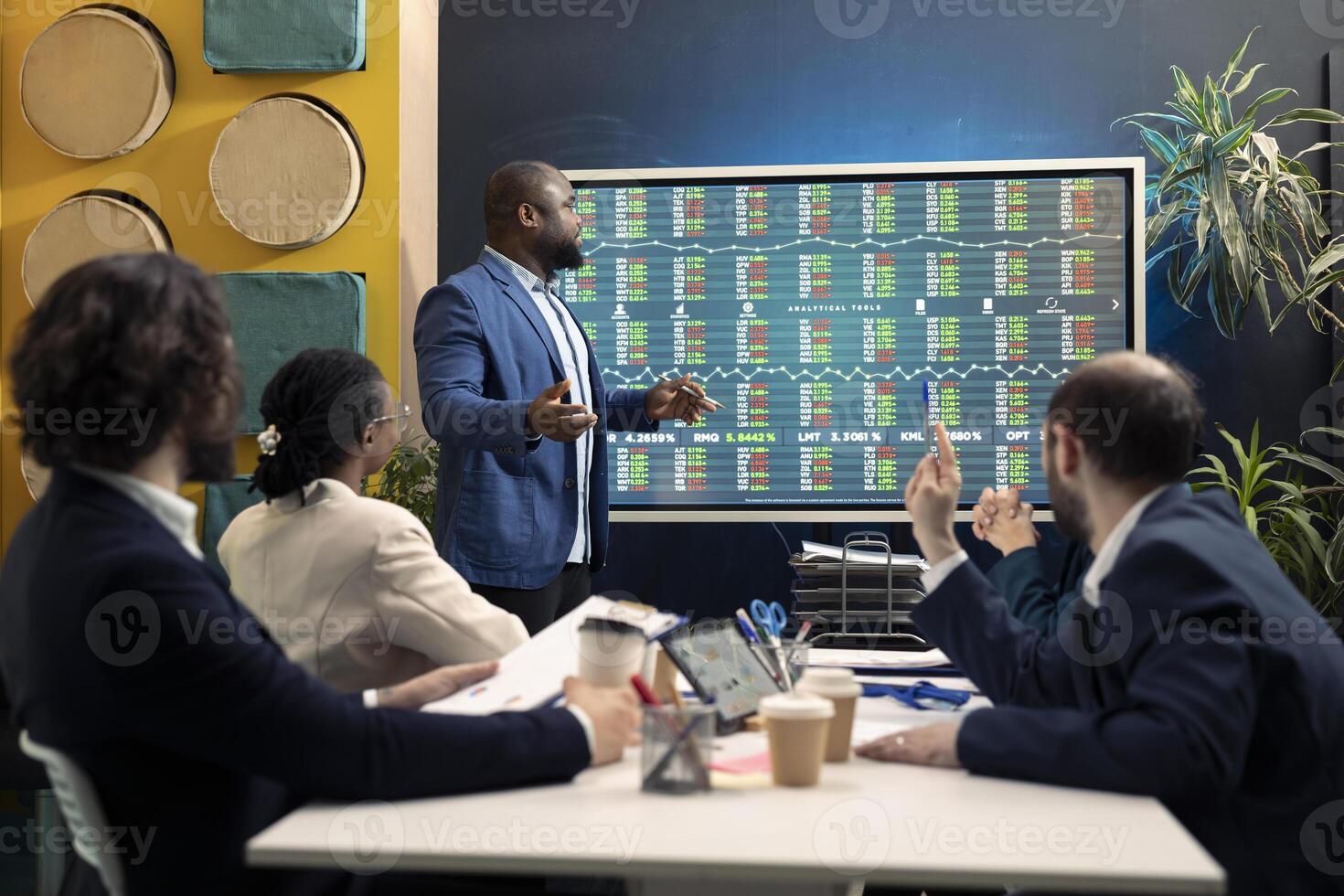 Business colleagues conducting an informational meeting to share details on projects and arrangements, evaluating the latest economic projections on interactive board to guarantee success. photo