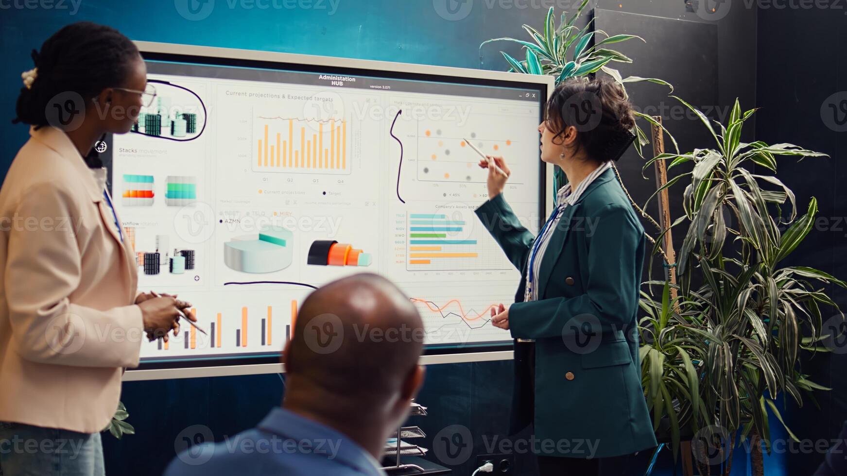 Team of business colleagues discussing agenda for upcoming events, planning and coordinating resources to sustain enterprise success. Employees communicate updates and align priorities. Camera B. photo
