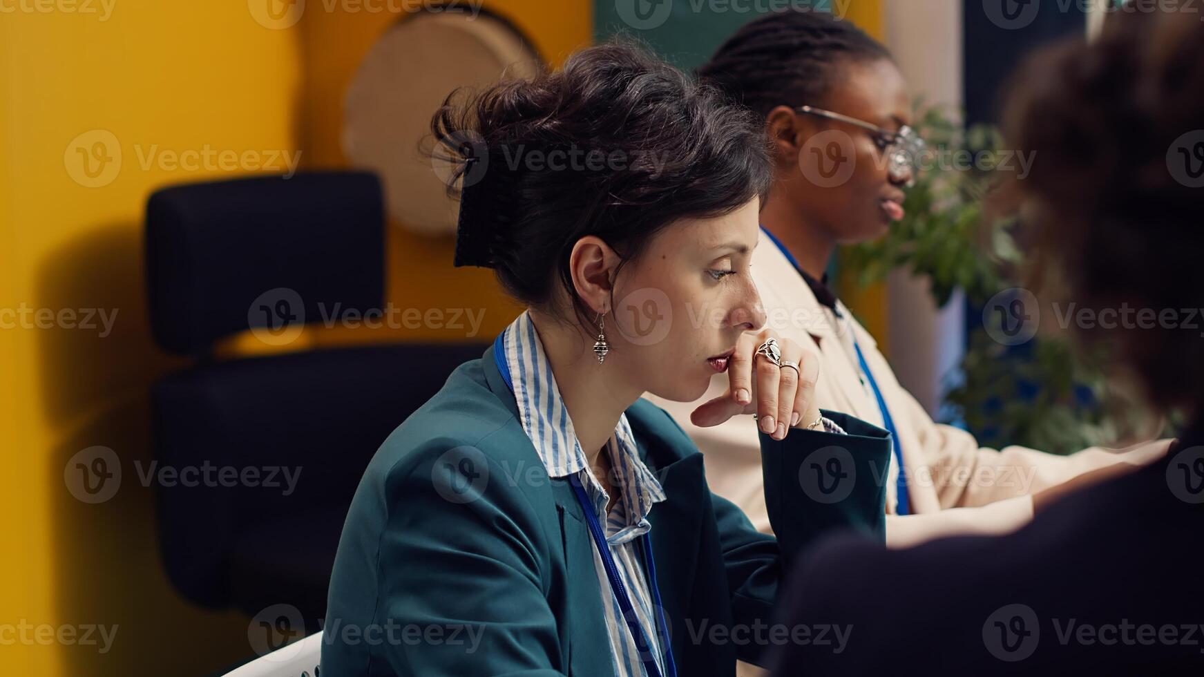 Tired overworked employee deciding to quit his job during important meeting, getting sick of being held responsible by the manager. Frustrated corporate worker leaving conference room. Camera A. photo