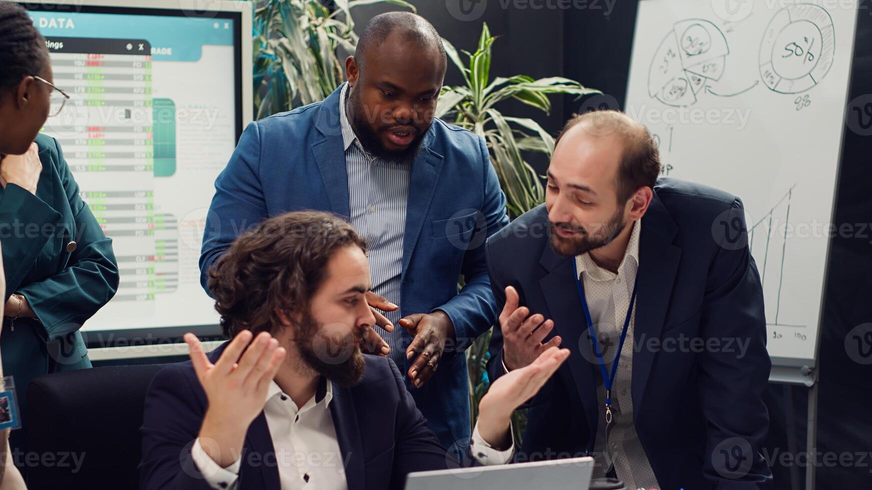 Tired overworked employee deciding to quit his job during important meeting, getting sick of being held responsible by the manager. Frustrated corporate worker leaving conference room. Camera A. photo