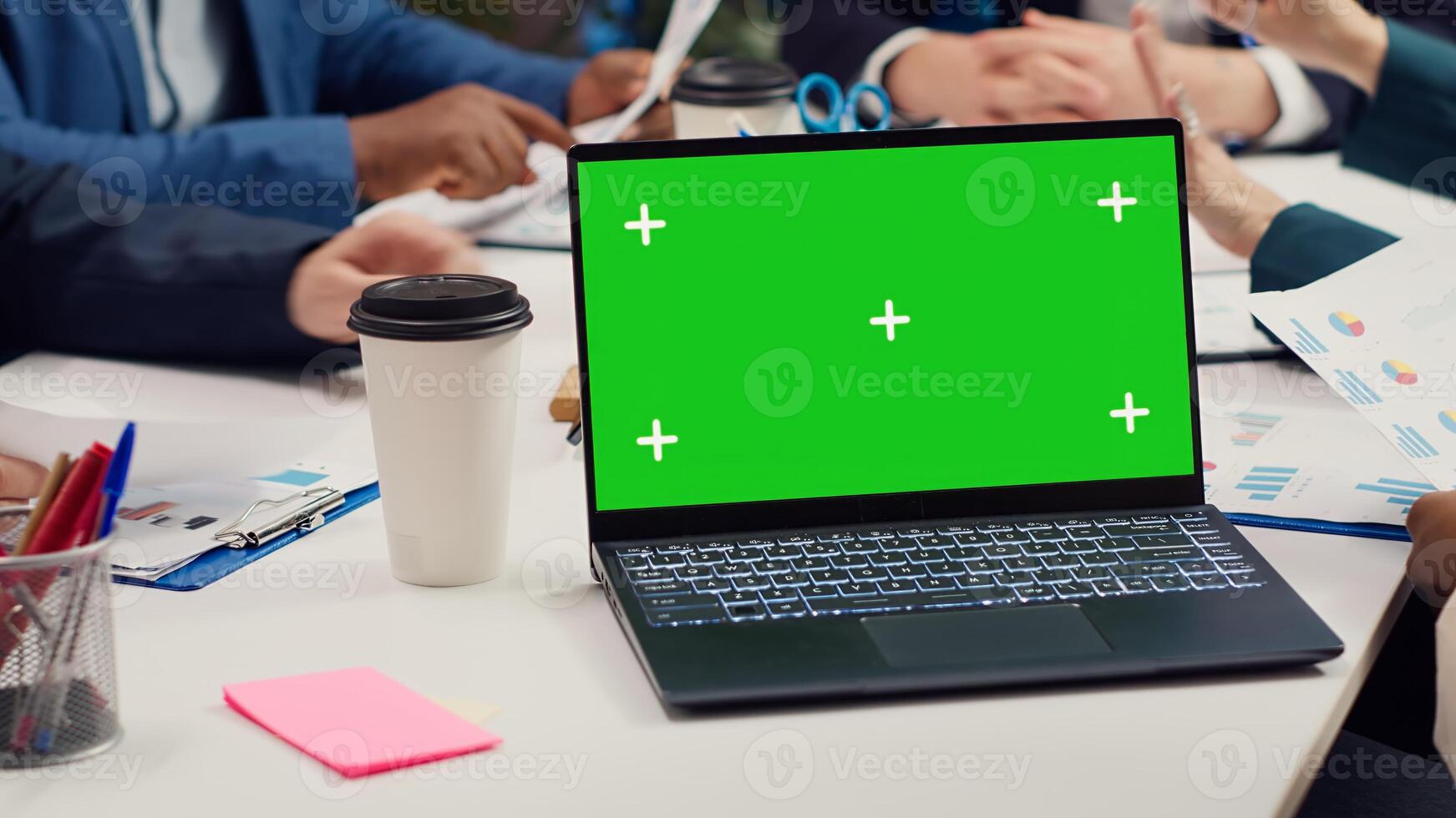 Product management team developing strategies with mockup display on laptop, sharing insight on projects and expressing concerns. Employees collaborating on enterprise growth. Camera A. photo