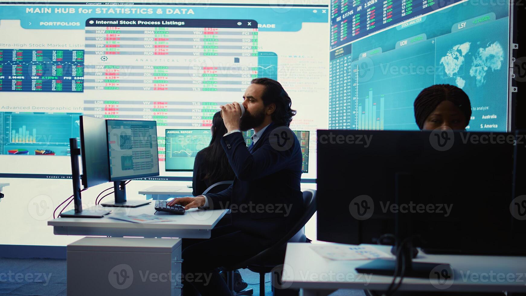 Corporate employee looking into project details and timetables in open coworking space, establishing budget and operations to accomplish goals in a competitive environment. Camera B. photo