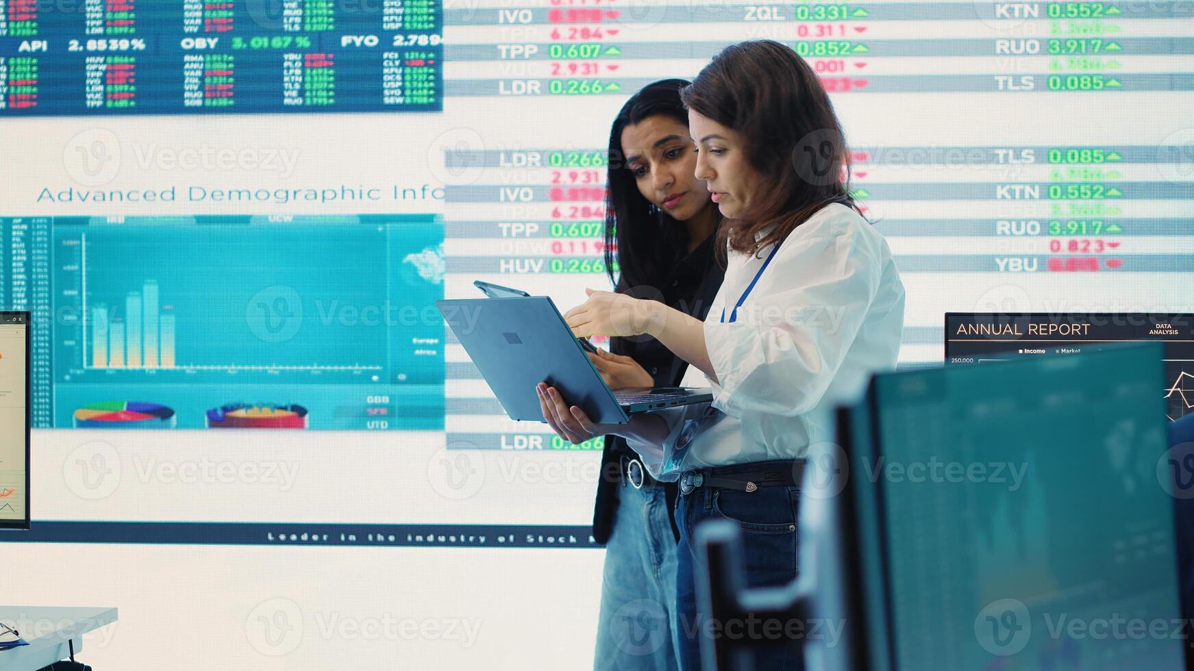 Coworkers team analyzing infographics to provide solutions on an issue affecting the project, looking to finish tasks before deadline. Business employees working together to ensure progress. Camera A. photo