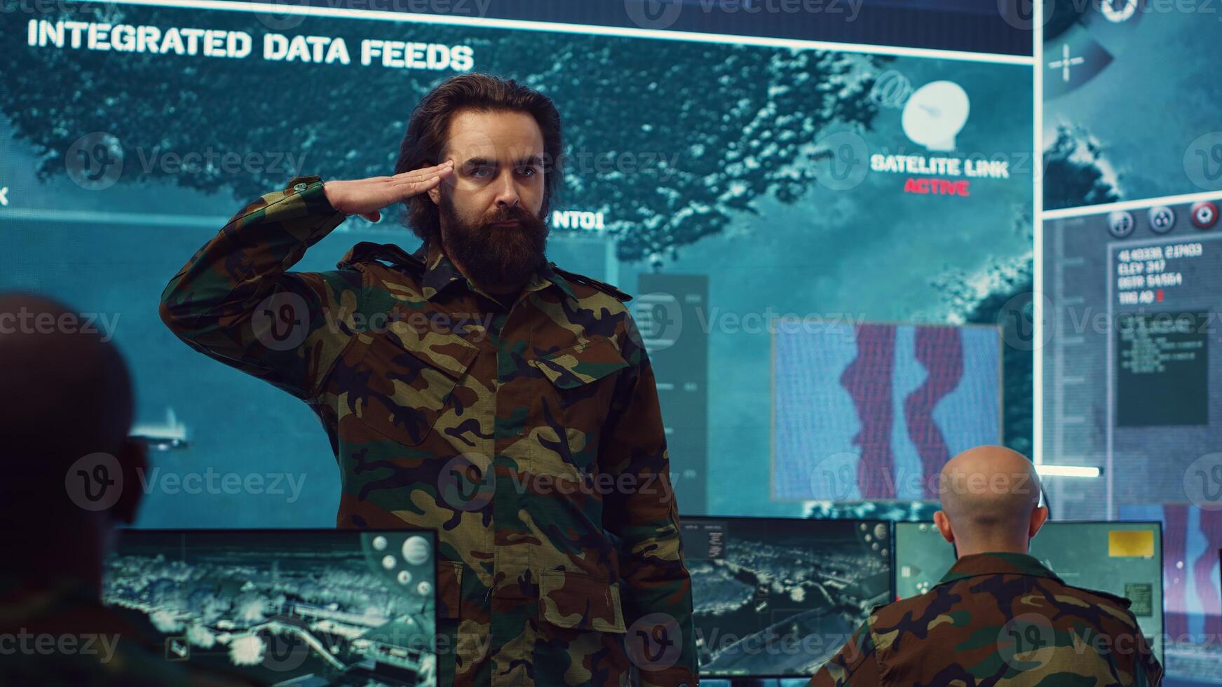 Lieutenant showing the solemn salute symbol in front of the major general, presenting his devotion and honor. Military person in camo uniform saluting the high ranking officers, army drill. Camera A. photo