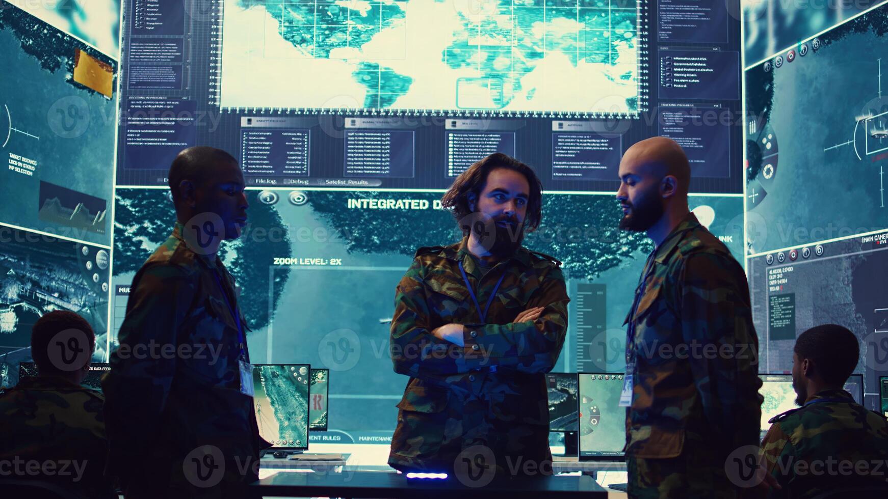 Army superior officers creating an attack plan using a hologram to gather real time information, working together to ensure national safety in a command center. Military operations. Camera B. photo