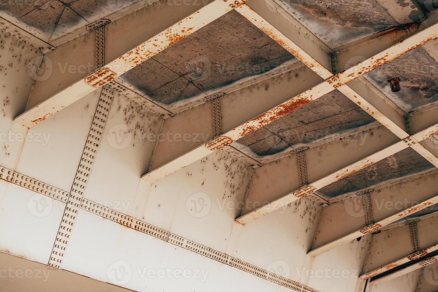 Metallic bridge lower section, low angle view photo