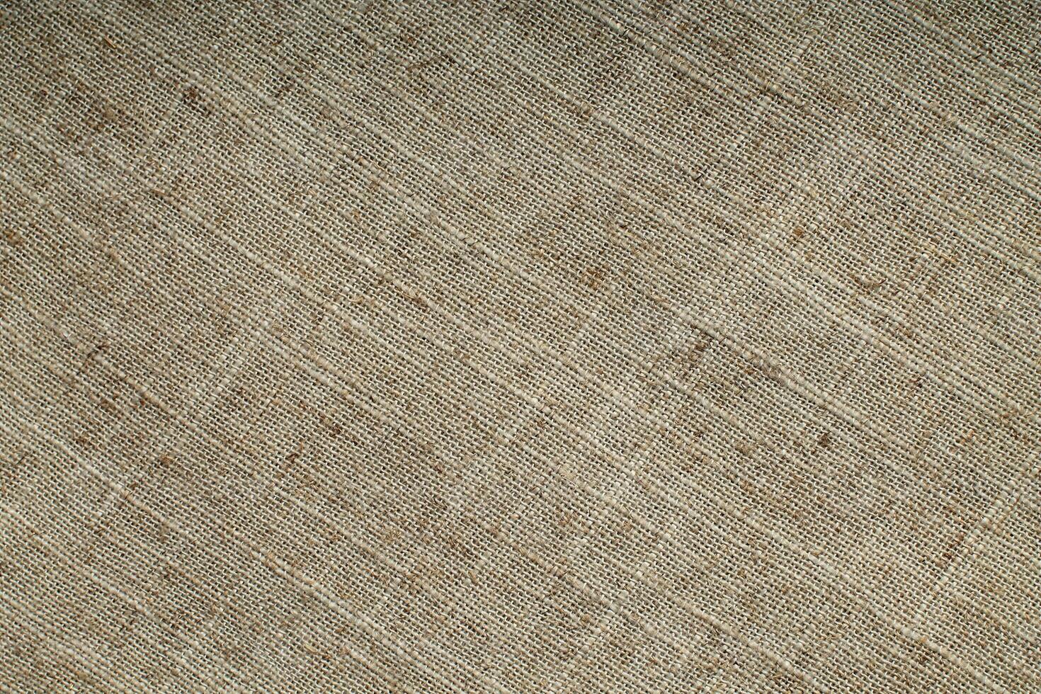 Close-up detail of fabric natural color Hemp material pattern design wallpaper. can be used as background or for graphic design photo