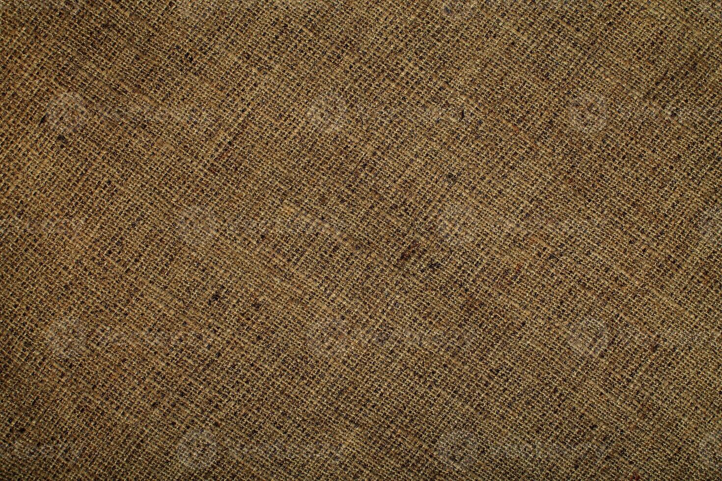 Close-up detail of fabric natural color Hemp material pattern design wallpaper. can be used as background or for graphic design photo
