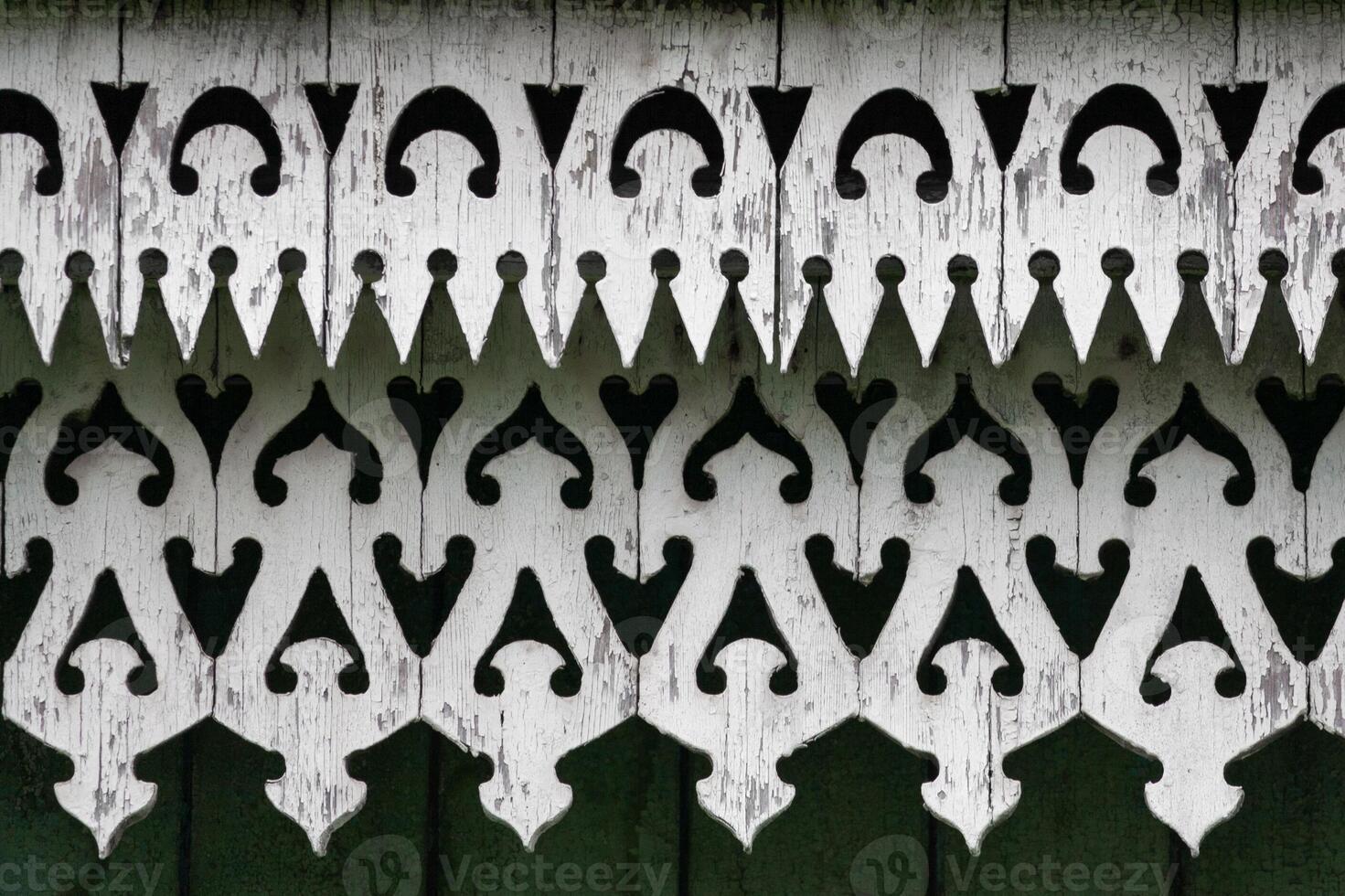 fragment of a wooden carved patterns photo