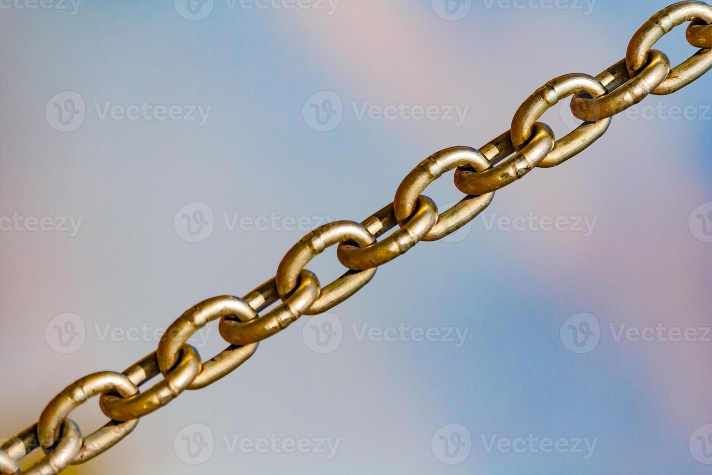 Iron chain against the sky photo
