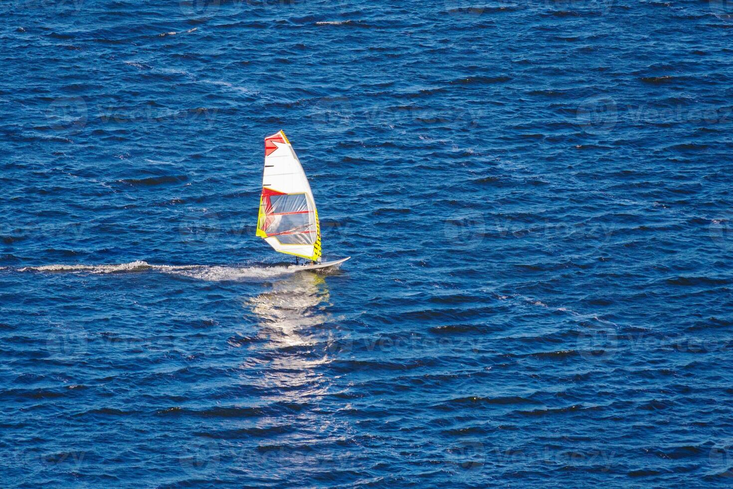 Windsurfer in the sea photo