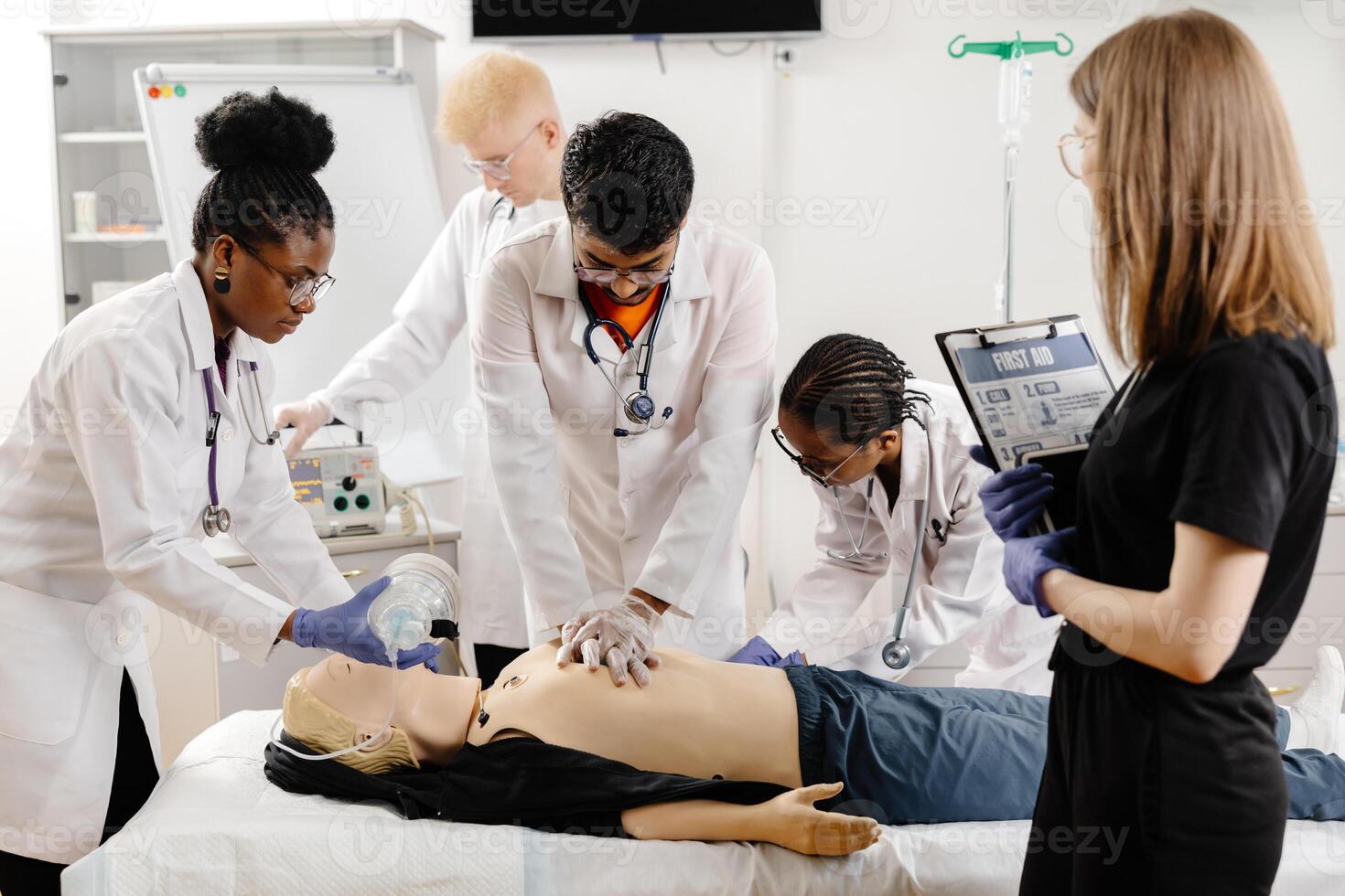 Medical Students Practicing CPR on a Training Dummy photo