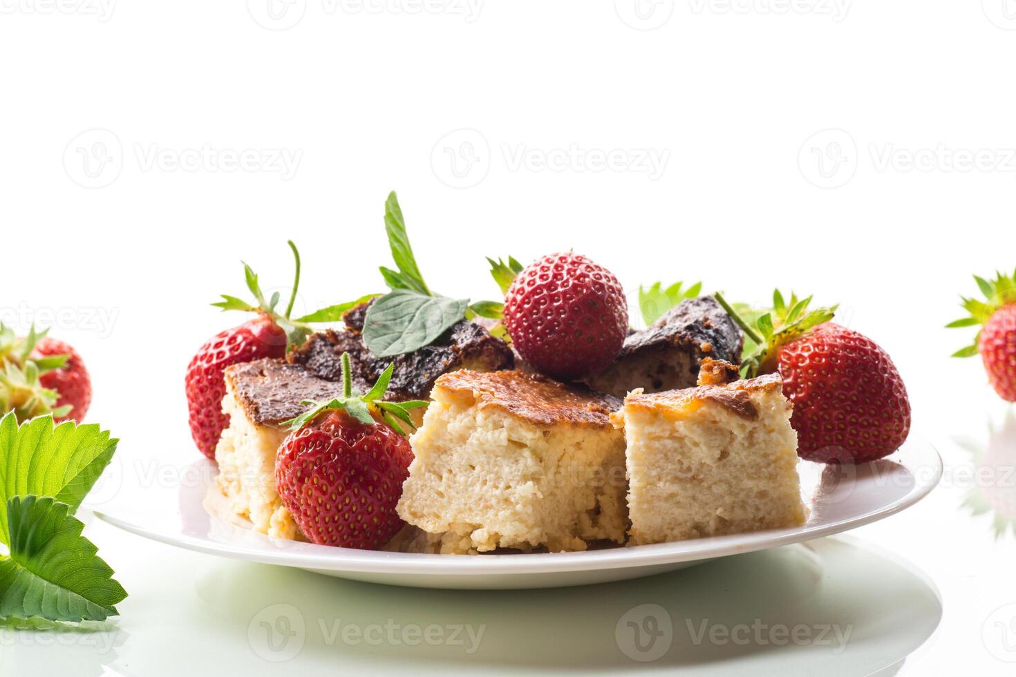 prepared cottage cheese casserole with fresh strawberries photo