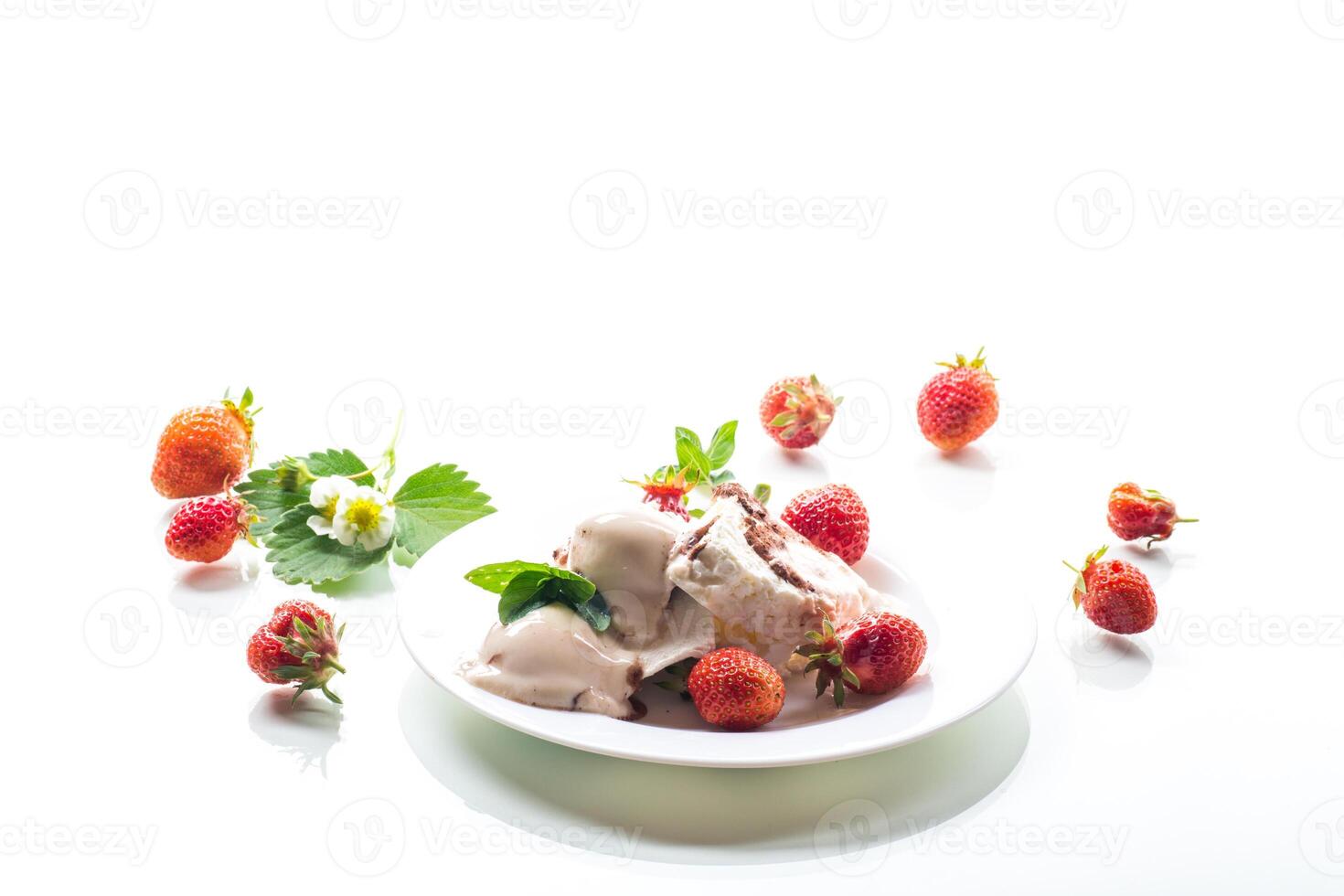 fresh organic cottage cheese with strawberries and ice cream in a plate photo