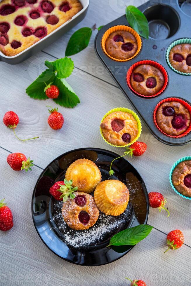 Sweet curd muffins with strawberry filling photo