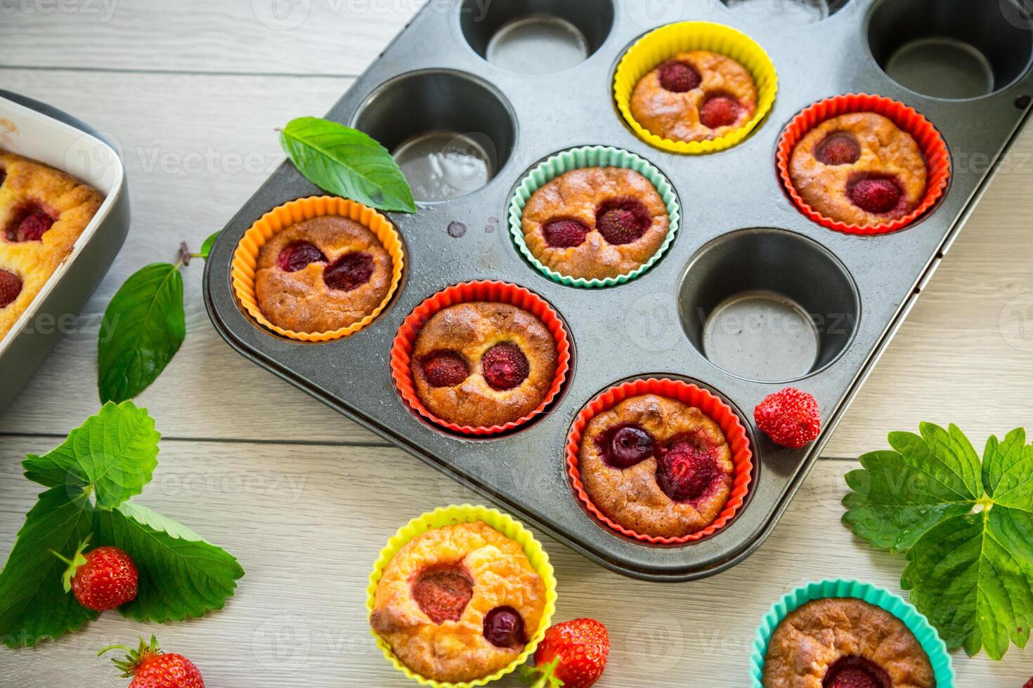 Sweet curd muffins with strawberry filling photo