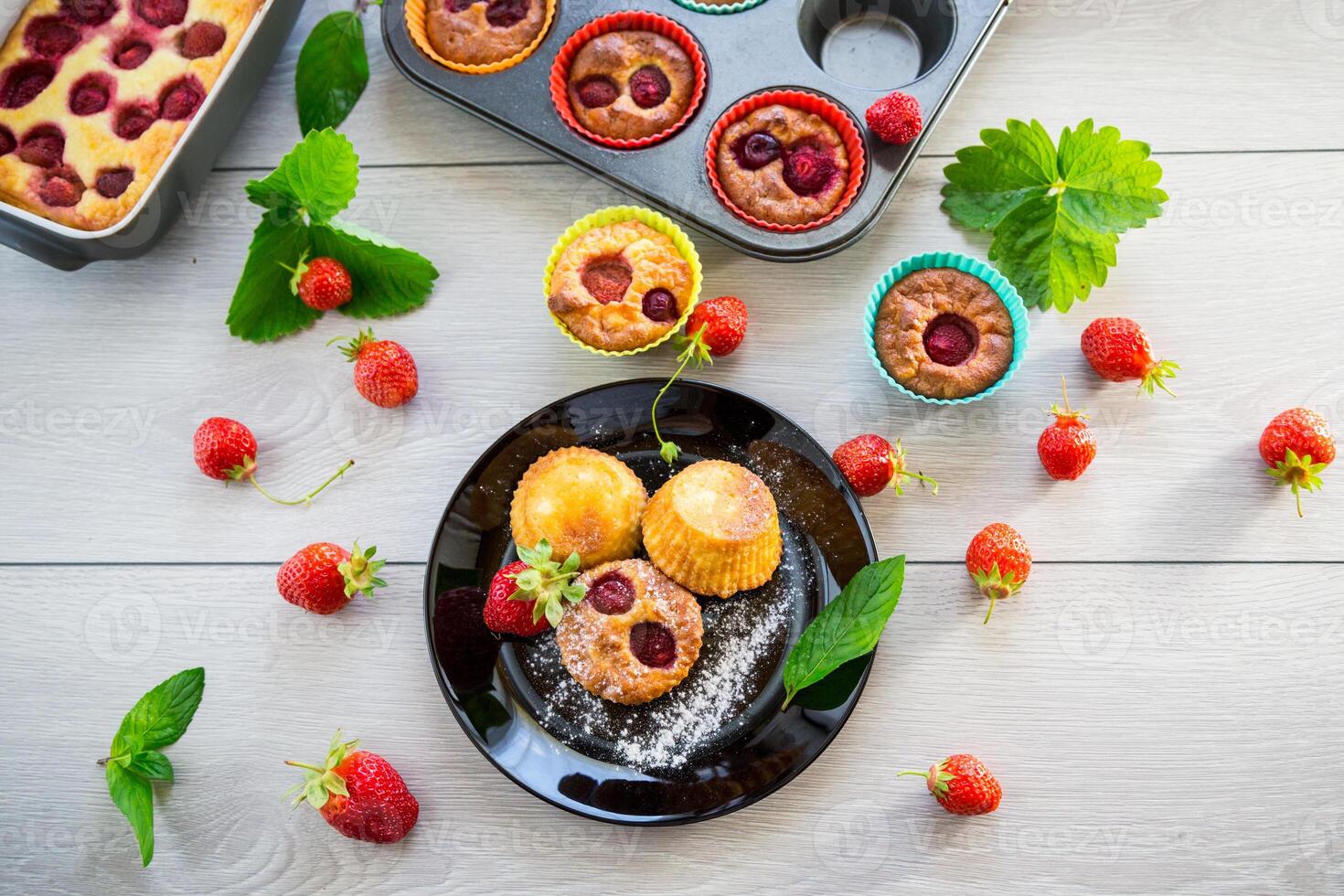 Sweet curd muffins with strawberry filling photo