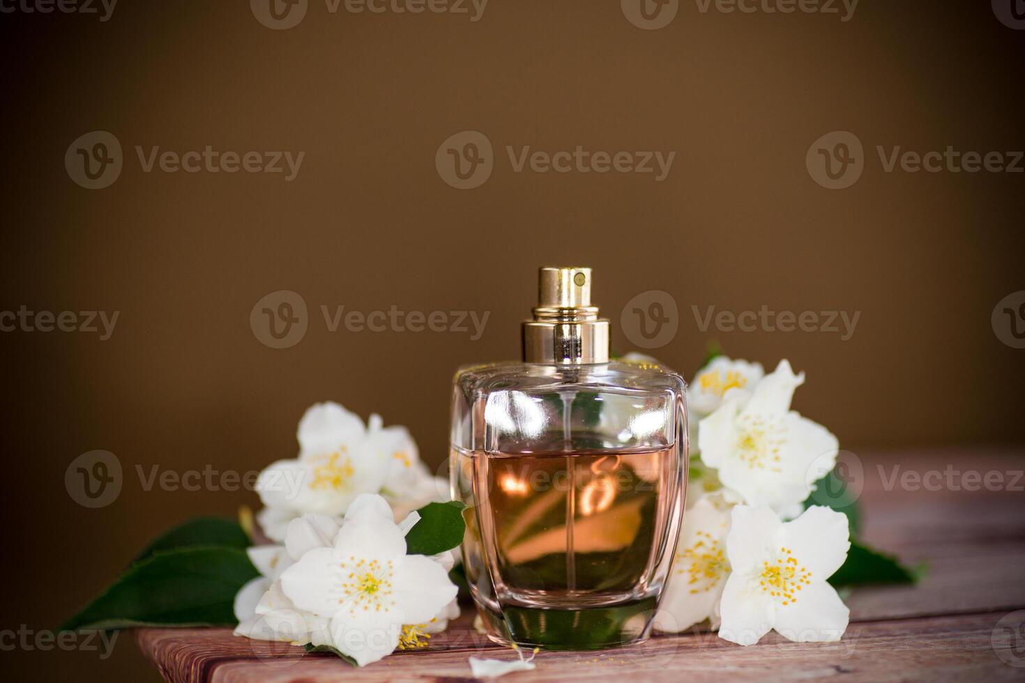 fragrant jasmine flowers and perfume photo