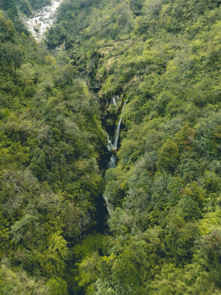 waterfall in nepal, best waterfall, waterfall during annapurna base cam trek in nepal photo