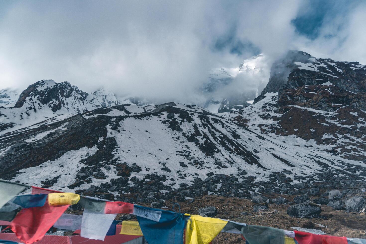 tibetan prayer flags in the mountains in nepal, Mountain in nepal, mount everest country, flags of the mountain in nepal photo