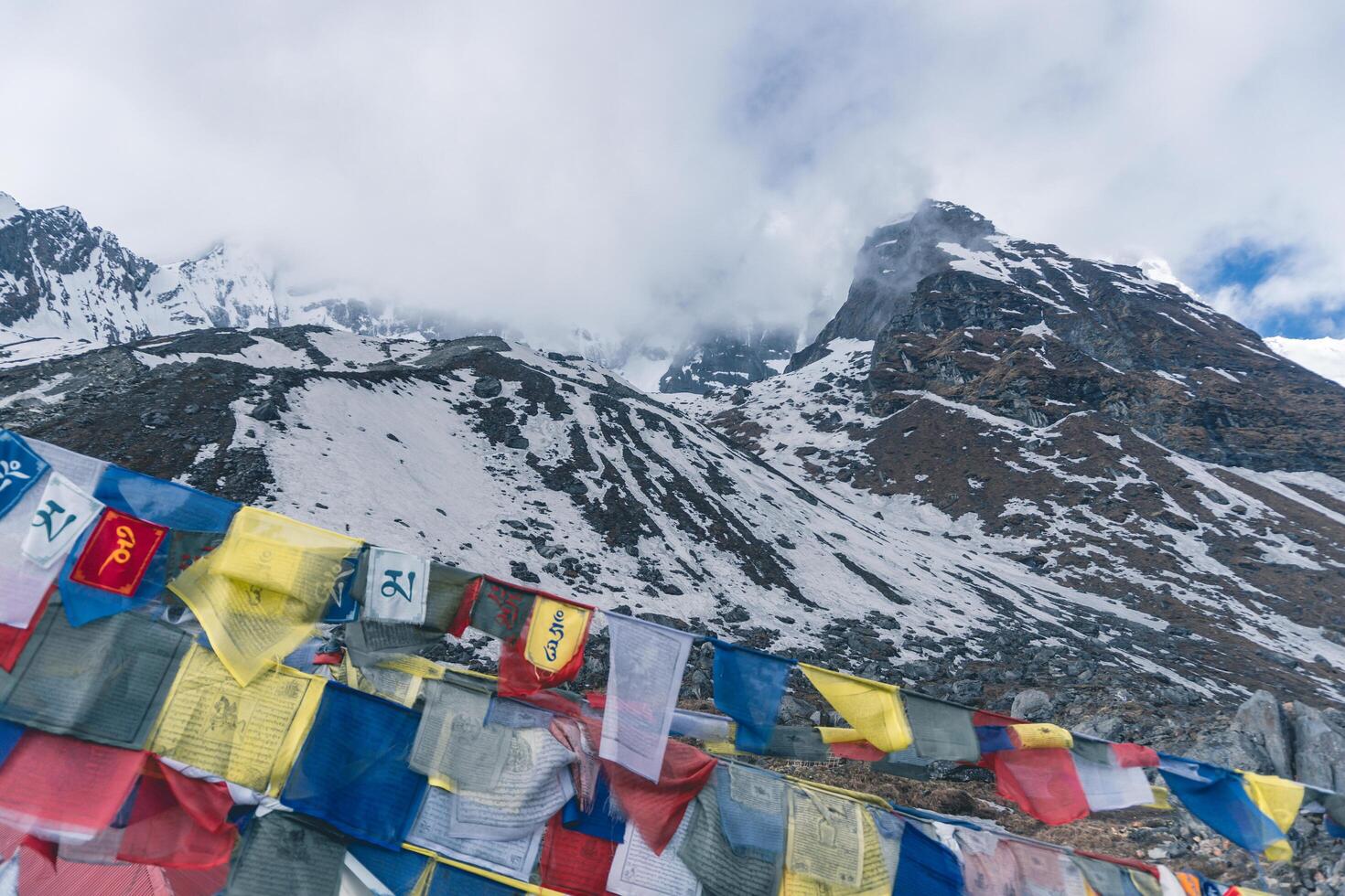 tibetan prayer flags in the mountains in nepal, Mountain in nepal, mount everest country, flags of the mountain, Annapurna Base Camp photo
