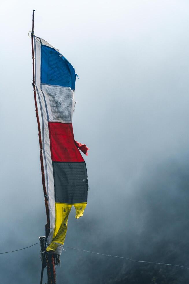 tibetan prayer flags in the mountains in nepal, Mountain in nepal, mount everest country, flags of the mountain in nepal photo