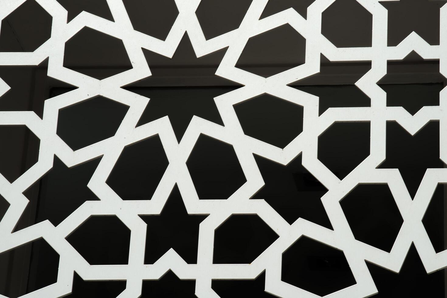 Black and white modern pattern. Black background photo